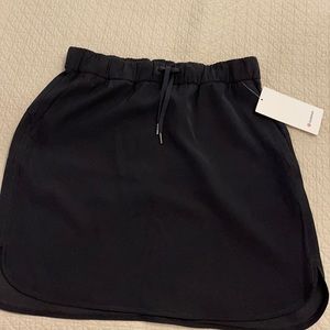 brand new size 12 black Lululemon On the Fly skirt